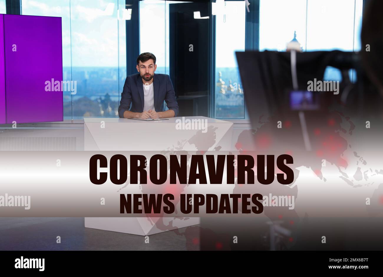 Presenter working in studio. Coronavirus pandemic - latest updates Stock Photo