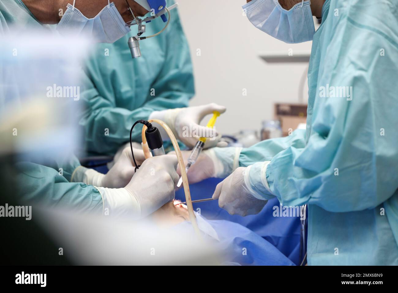 Professional doctors performing Stock Photo