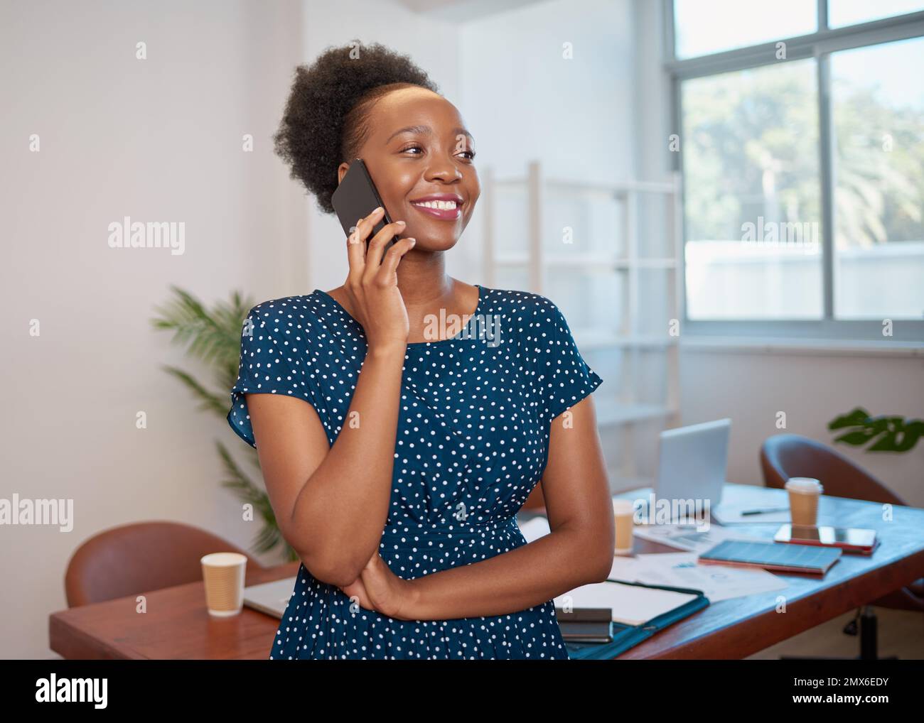 Young black woman talks on hi-res stock photography and images - Alamy