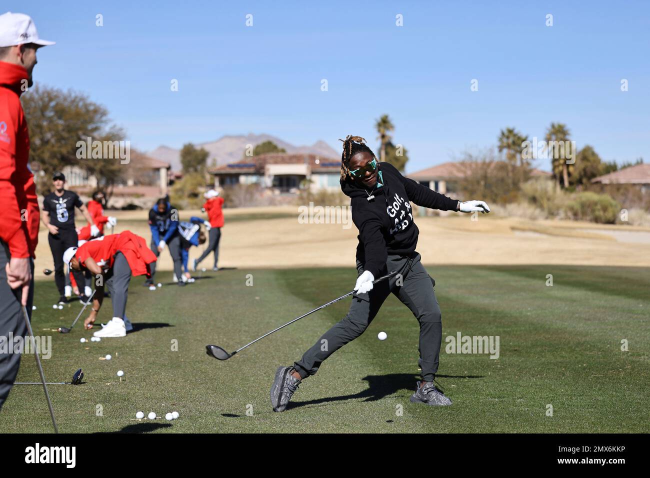 TikTok star Snappy Gilmore demonstrates his technique to AFC Kicker Justin  Tucker before the Long Drive event at the NFL Pro Bowl Games on Wednesday,  February 1, 2023, at Bear's Best Golf