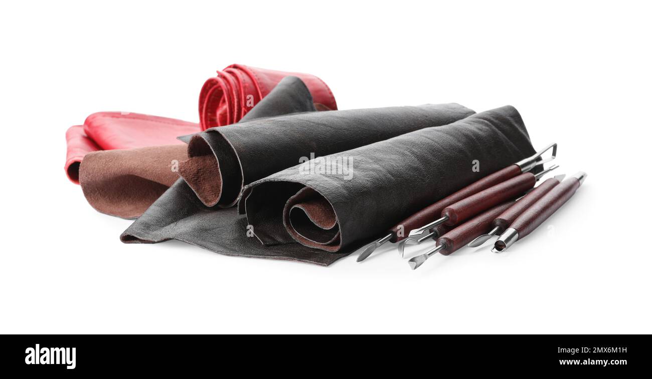Leather samples and craftsman tools isolated on white Stock Photo