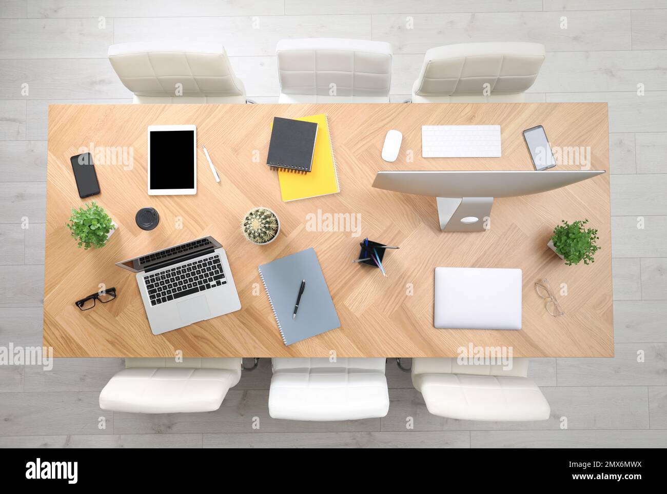 Modern office table with devices and chairs, top view Stock Photo Alamy