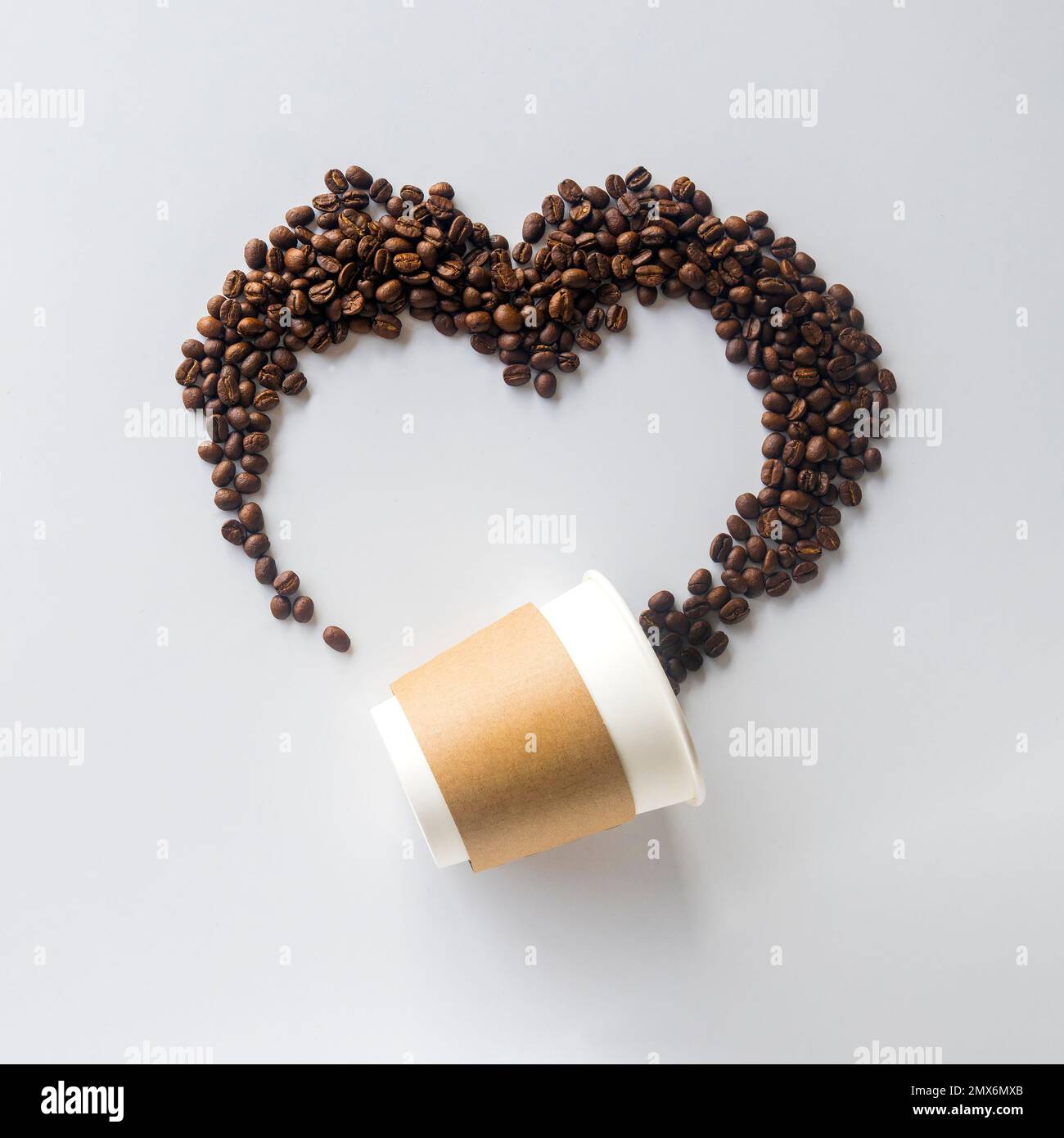 Coffee lover. Top view of paper cup and Coffee beans arranged in a ...
