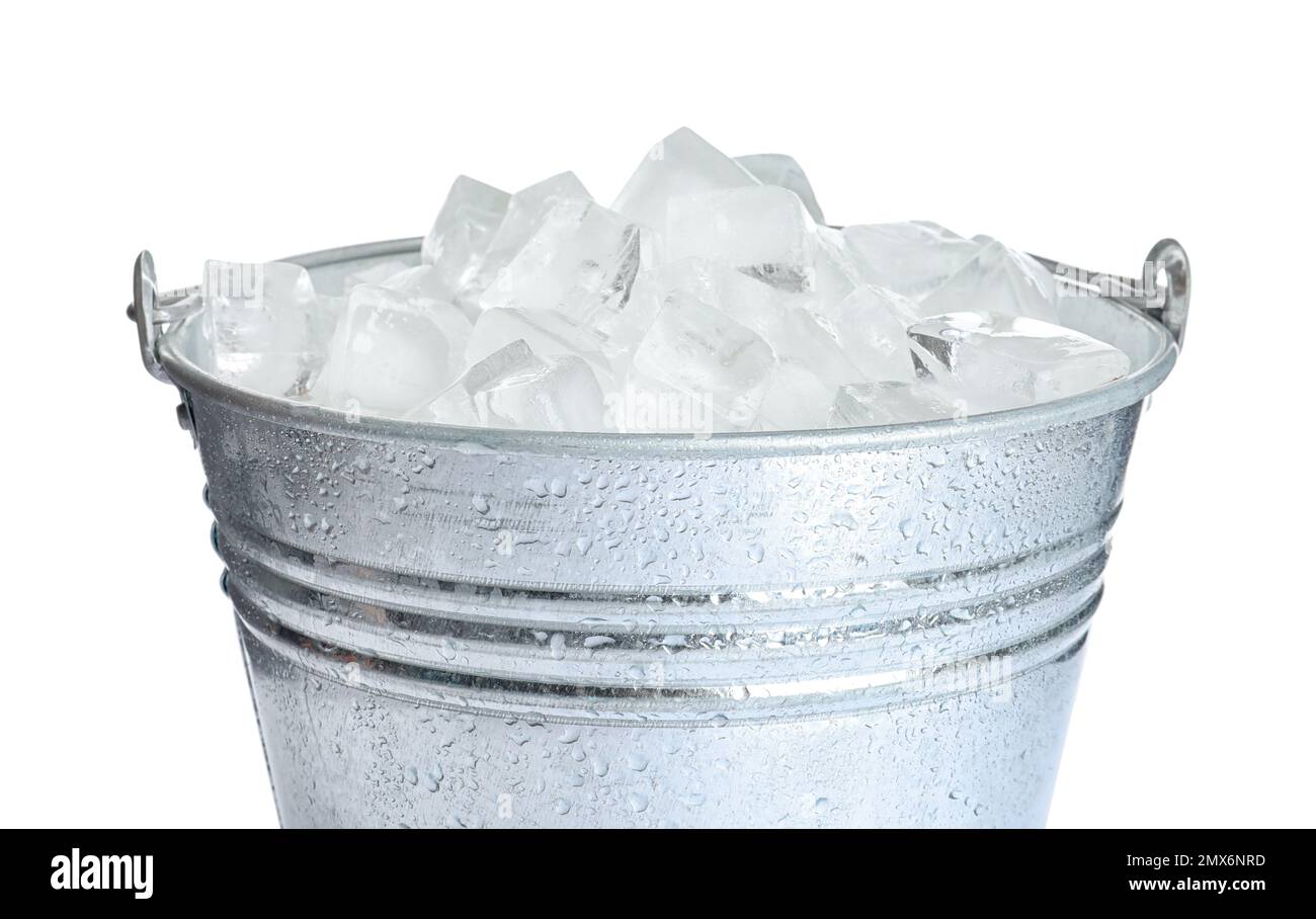 Full metal bucket with ice cubes and pieces of crushed ice isolated on  white background. Stock Photo