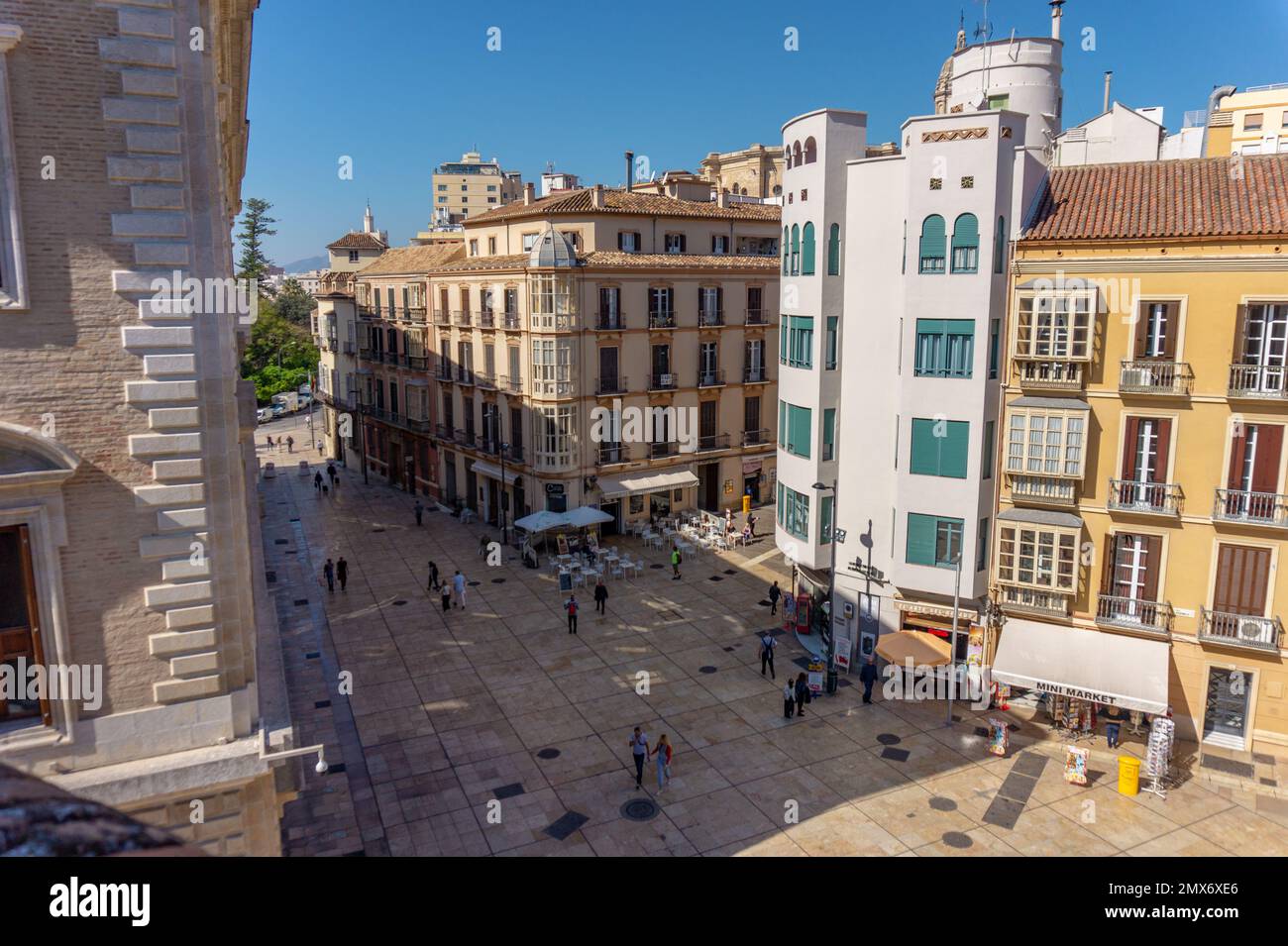 Malaga,Spain 04.04.2019: Decorated exteriours residental buildings in Malaga city, Andalusia, Spain with palm trees , Stock Photo