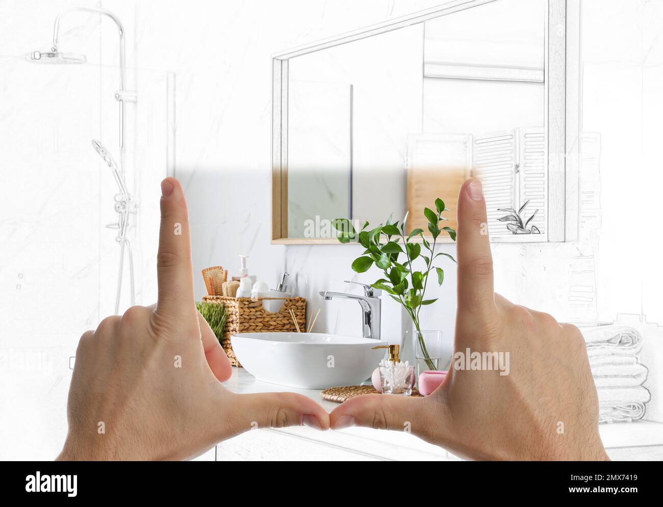 Man showing frame gesture and making bathroom real out of drawing Stock
