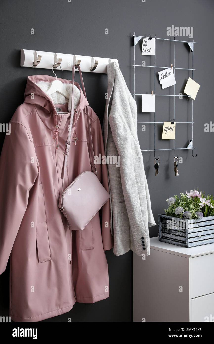 Hallway interior with stylish furniture, clothes and accessories Stock ...