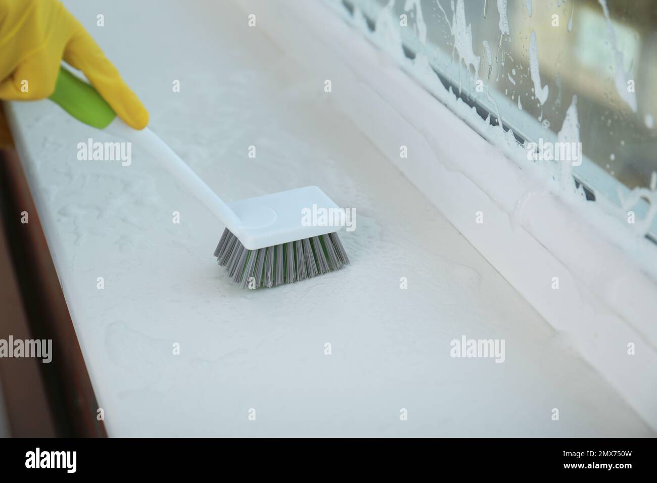 Hand cleaning window sill hi-res stock photography and images - Alamy