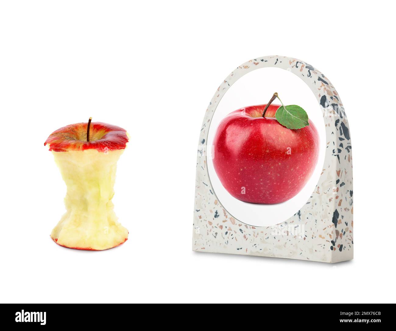 Apple core and mirror with reflection on white background Stock Photo
