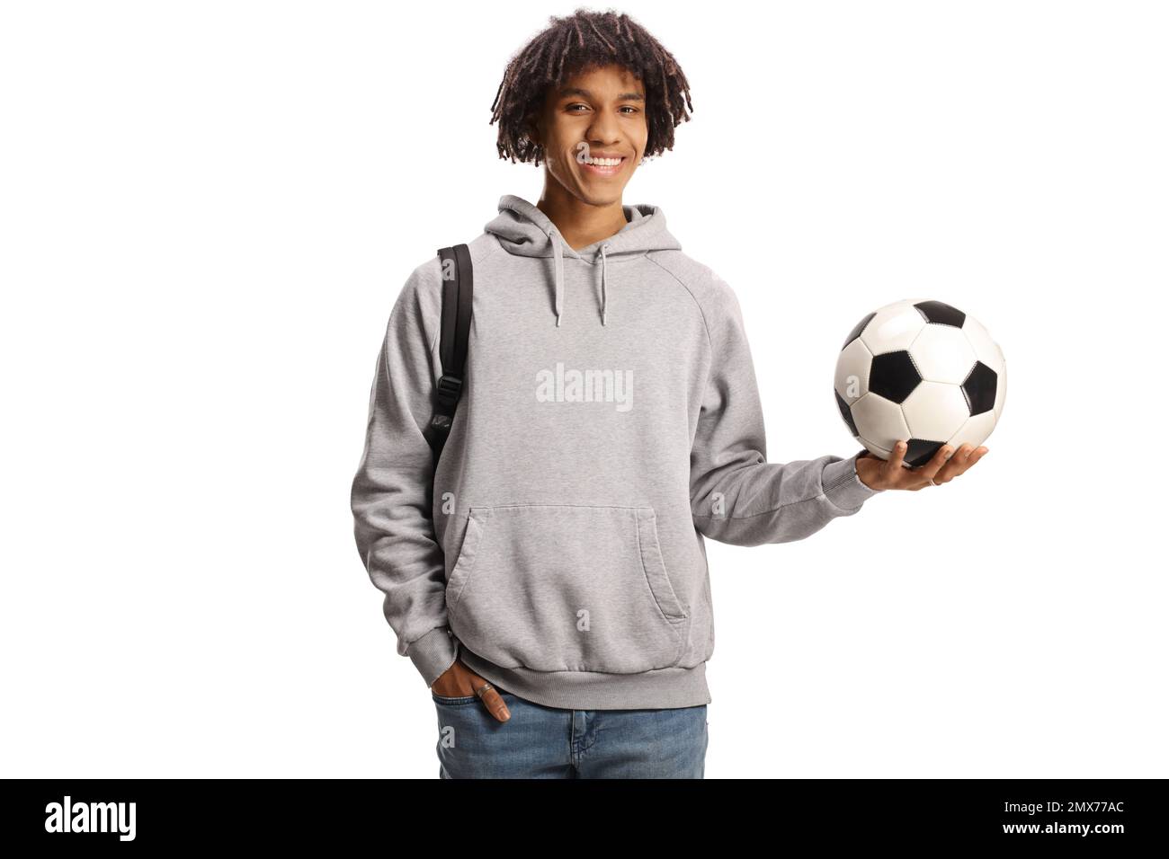 Male african american student with a backpack holding a football ...
