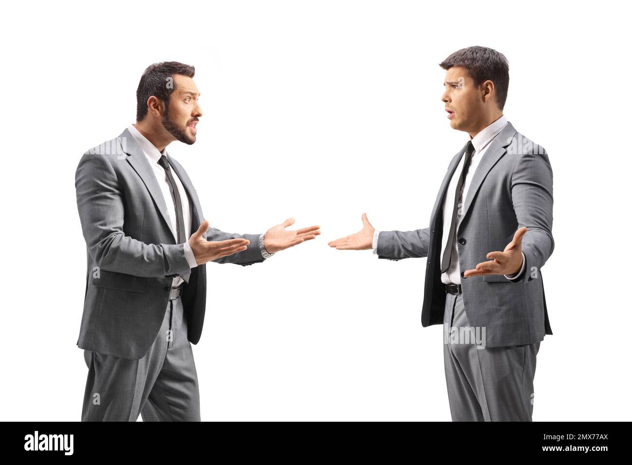 Two businessmen having an argument isolated on white background Stock