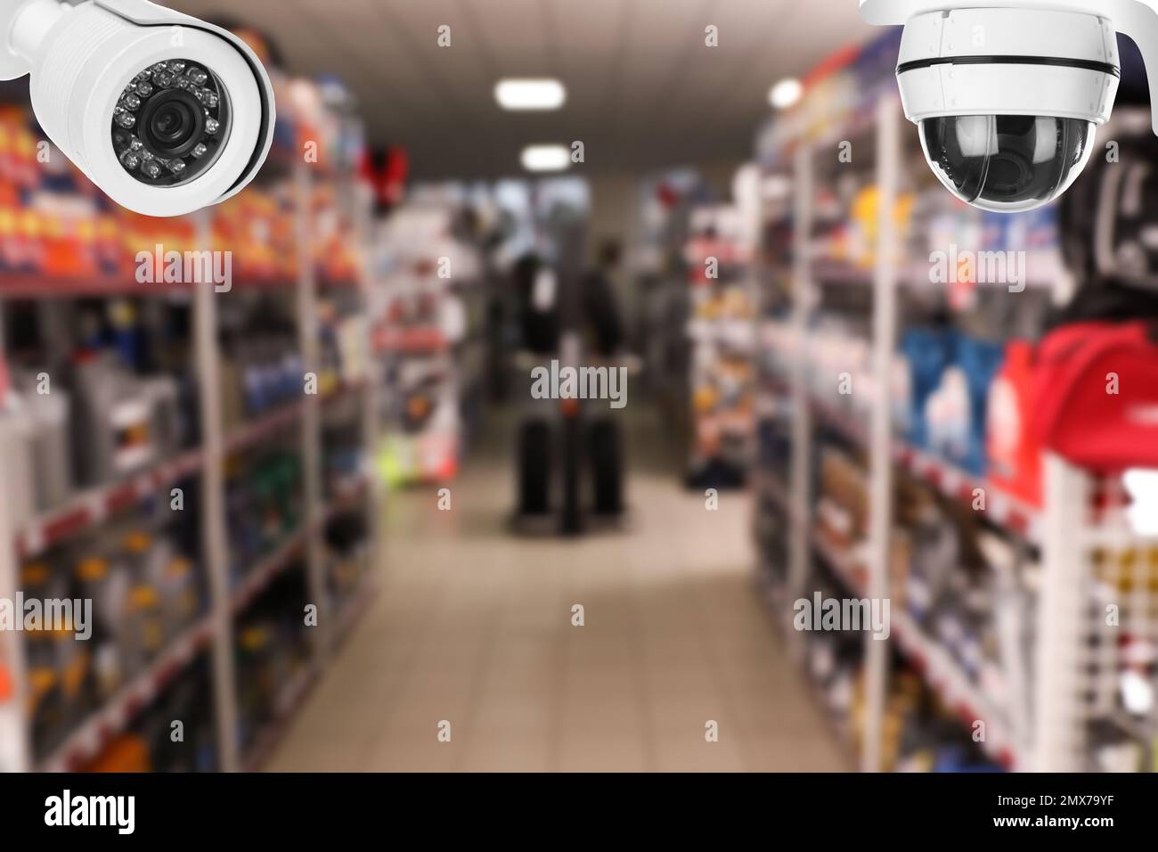 Modern CCTV security cameras in auto store. Guard equipment Stock Photo