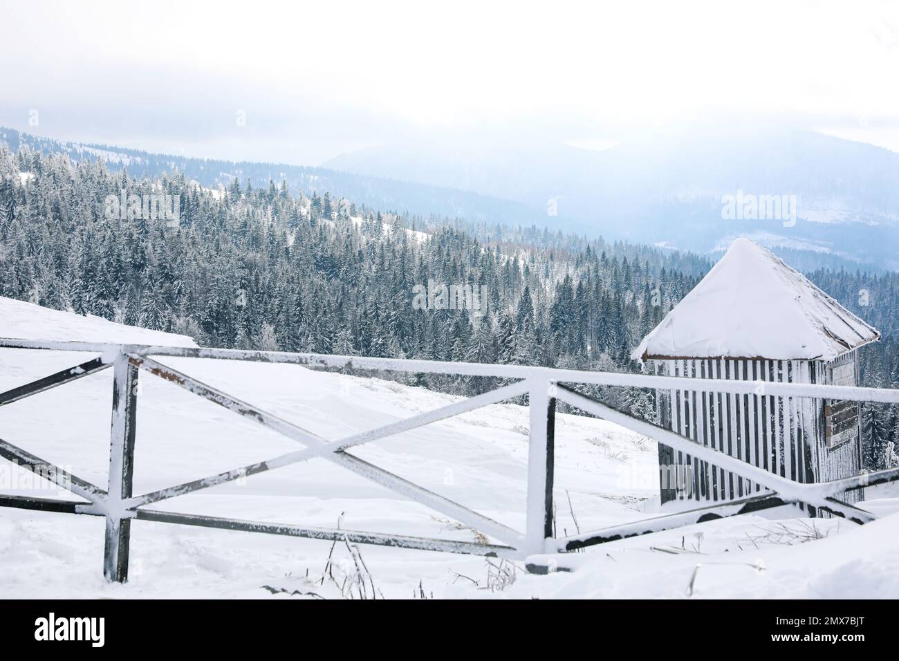 Picturesque view of snowy hills at mountain resort Stock Photo - Alamy