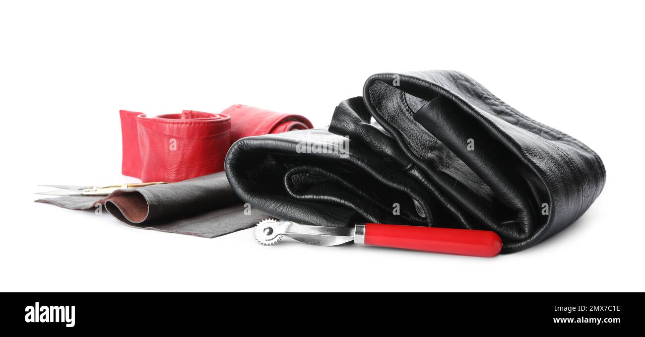 Leather samples and craftsman tools isolated on white Stock Photo