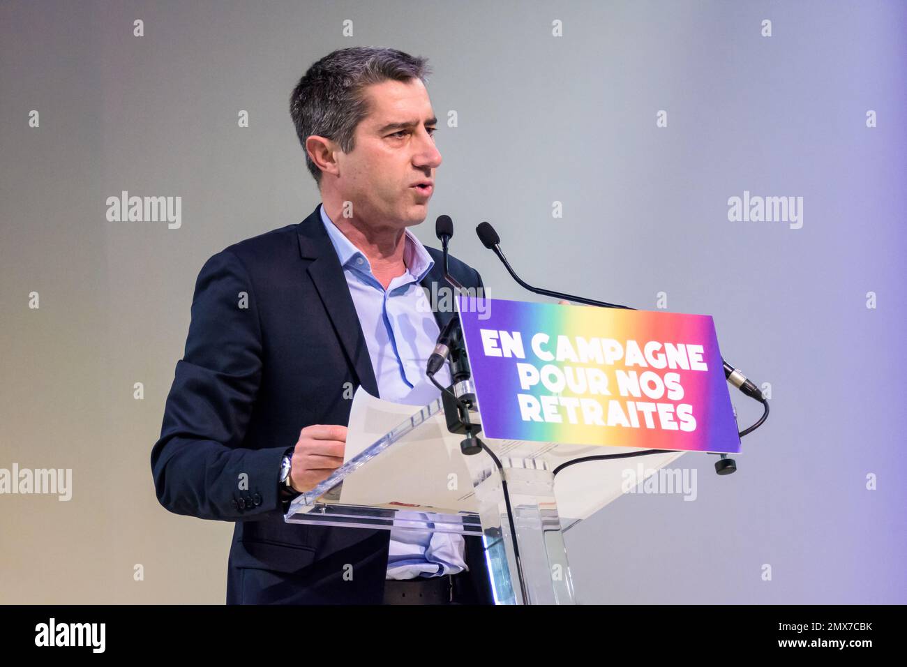 French deputy François Ruffin gives a speech at a rally of the Nouvelle Union populaire écologique et sociale (NUPES) against the pension reform. Stock Photo