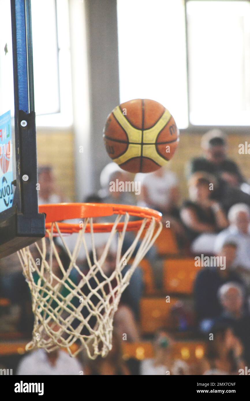Basketball in hoop, Italian Basketball League Stock Photo Alamy