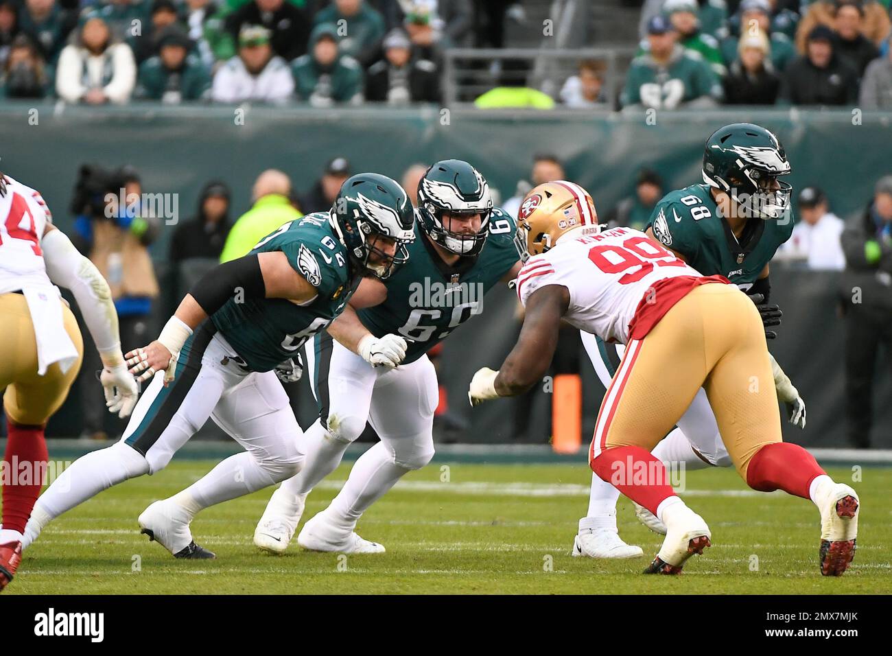 Philadelphia, Pennsylvania, USA. 29th Jan, 2023. Pennsylvania, USA; Philadelphia Eagles center Jason Kelce (62) and center Landon Dickerson (69) double up to block San Francisco 49ers defensive tackle Javon Kinlaw (99) during the first half of the NFC Championship in Philadelphia, Pennsylvania. Mandatory Credit Eric Canha/CSM/Alamy Live News Stock Photo