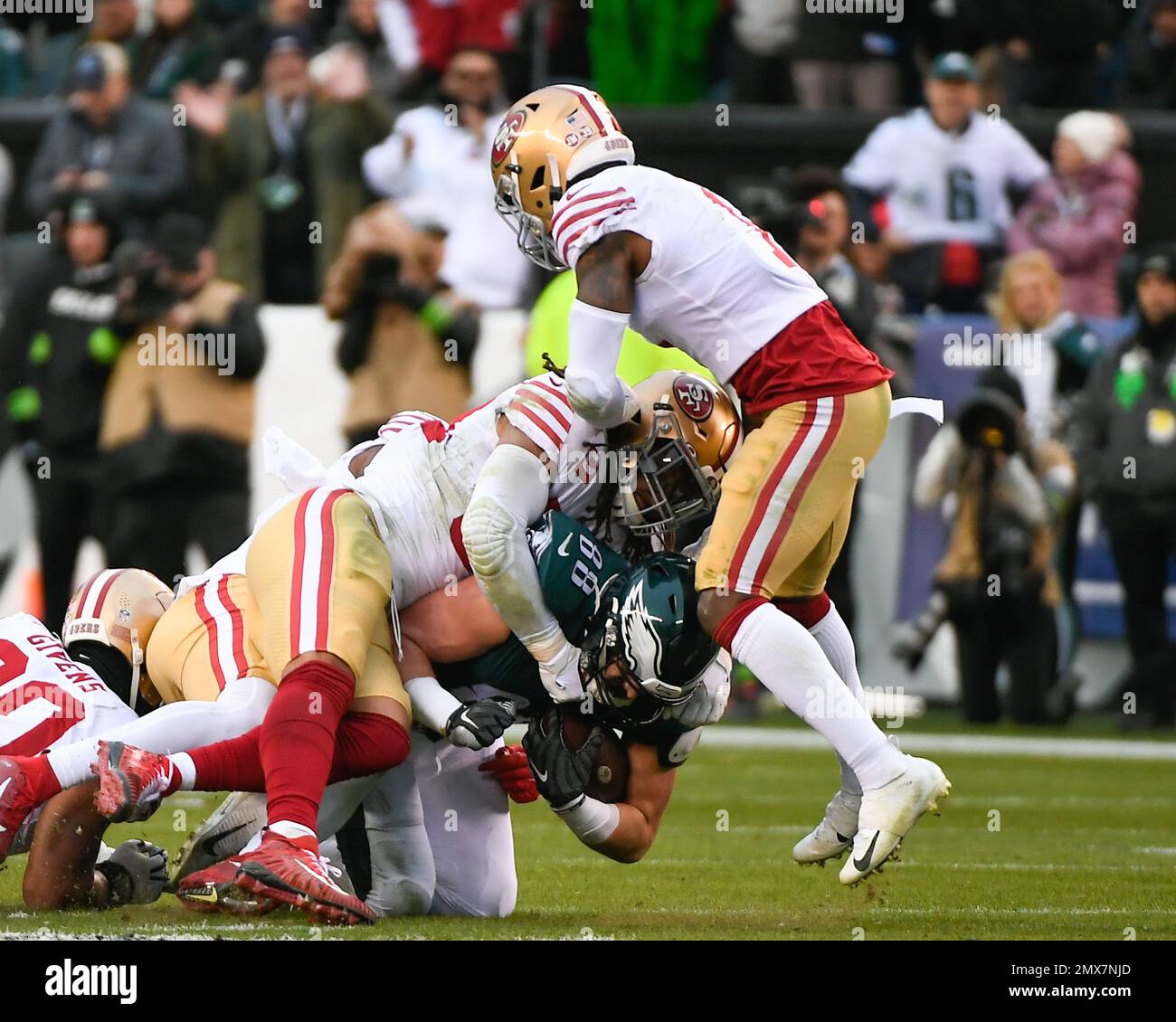 Philadelphia, Pennsylvania, USA. 29th Jan, 2023. Pennsylvania, USA; Philadelphia Eagles tight end Dallas Goedert (88) is dragged to the turf by the San Francisco 49ers defense during the first half of the NFC Championship in Philadelphia, Pennsylvania. Mandatory Credit Eric Canha/CSM/Alamy Live News Stock Photo