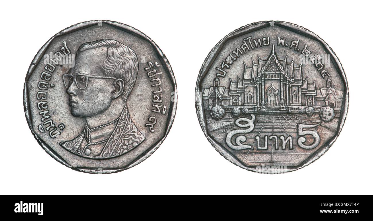 Both sides of the 5 Thai bath coin featuring bust of King Rama IX on obverse and Wat Benchamabophit, aka The Marble Temple on reverse. Stock Photo