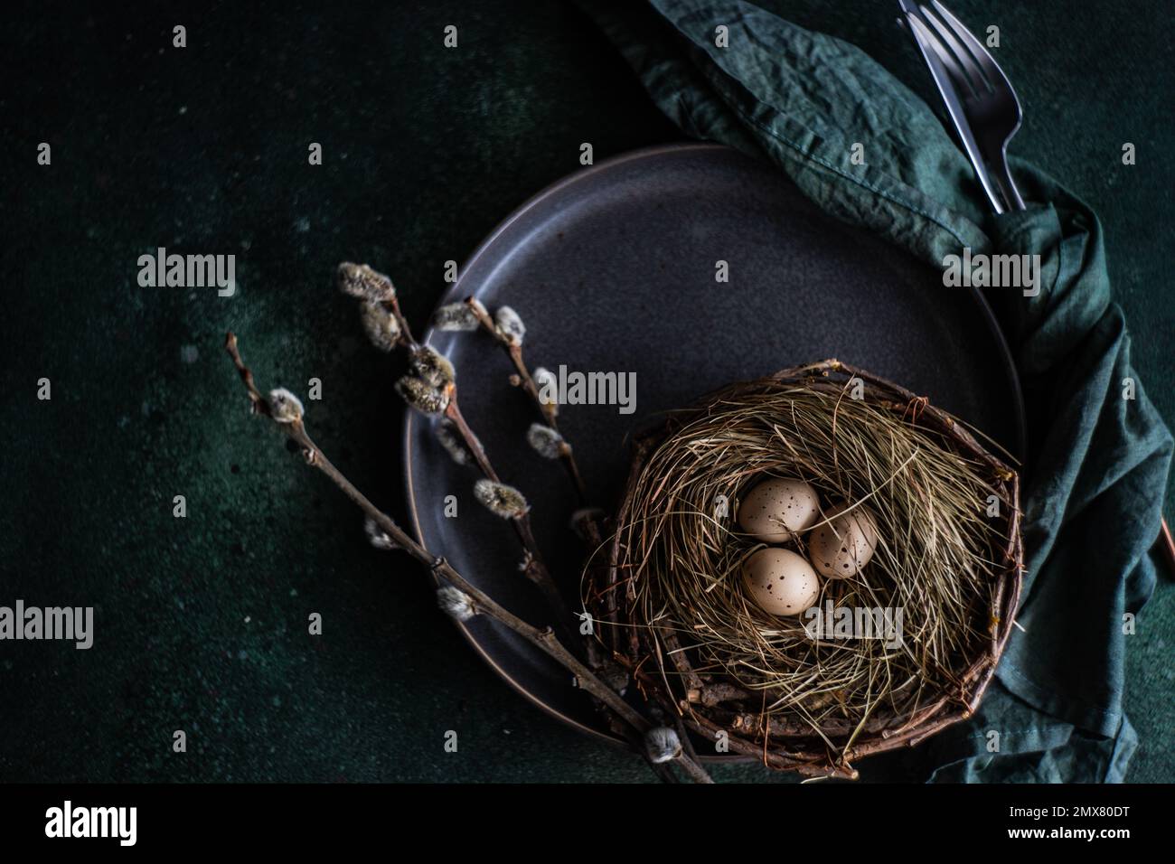 From above easter holiday dinner set with eggs on concrete table Stock Photo
