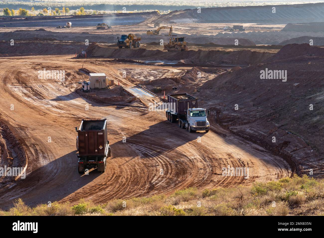 Contaminated urnanium tailings being removed at the UMTRA tailings project in Moab, Utah.  Because the uranium tailings are still radioactive, the con Stock Photo