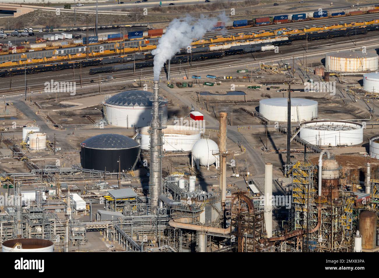 An oil refinery and oil storage tanks near Salt Lake City, Utah. Behind
