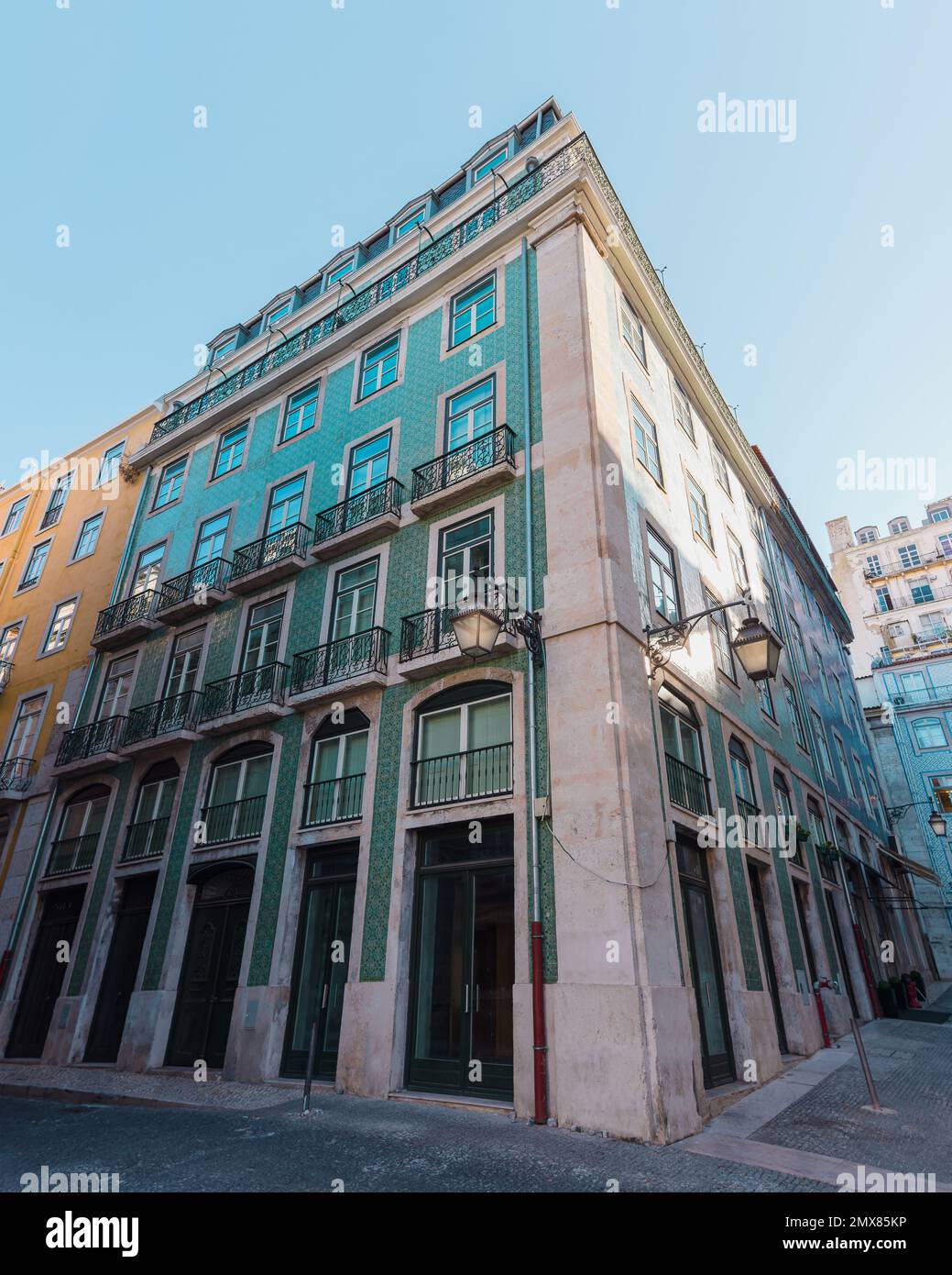 Traditionally tiled house in Lisbon, Portugal. Turquoise green azulejo