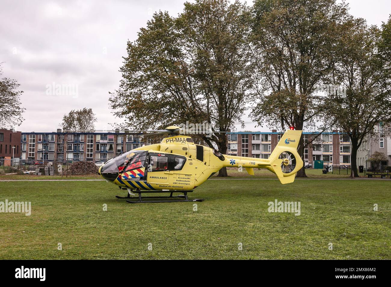Dutch ANWB trauma helicopter landed on a grass field Stock Photo