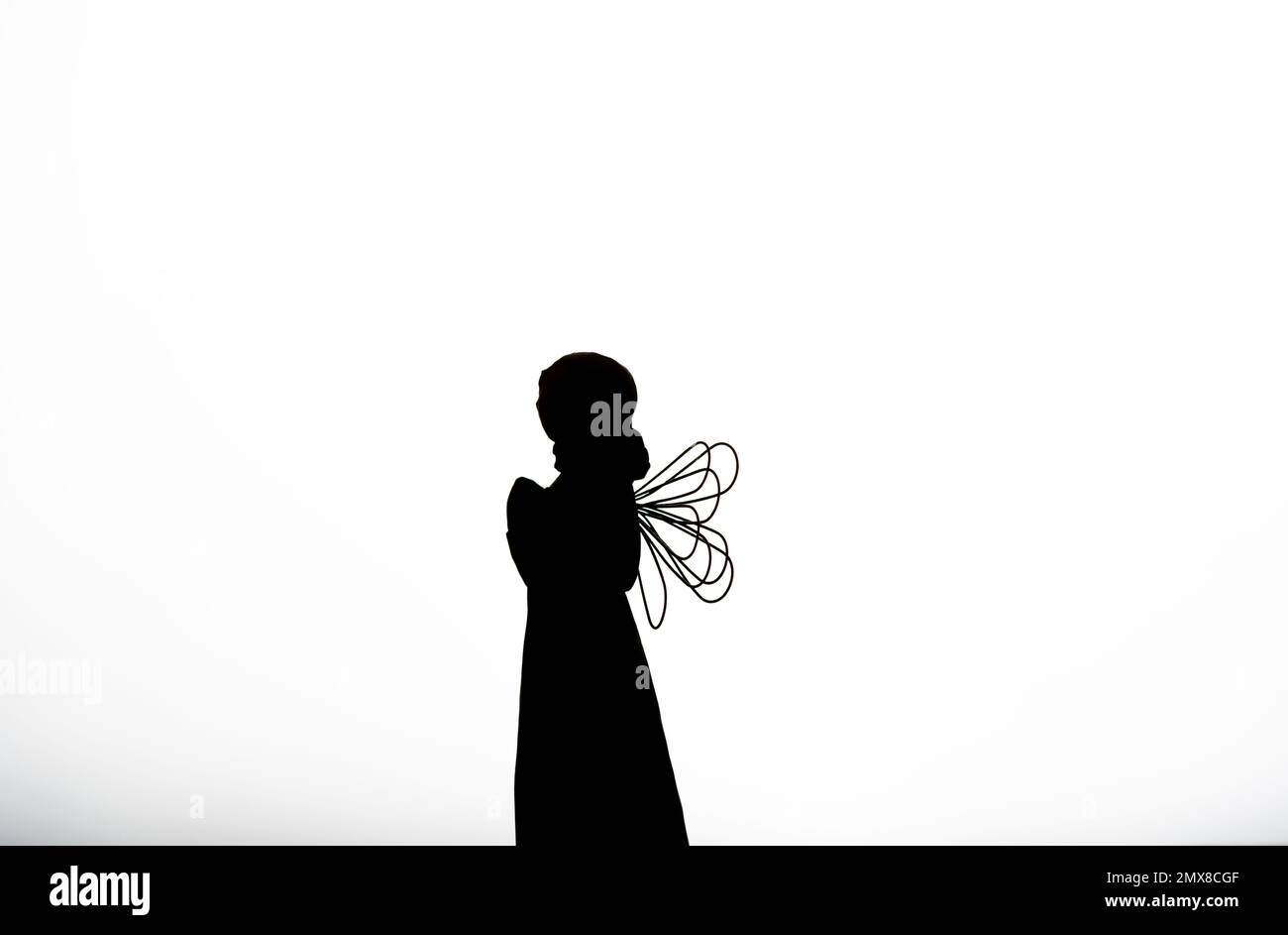 silhouette of an Angel on white background with meaning, perfect for