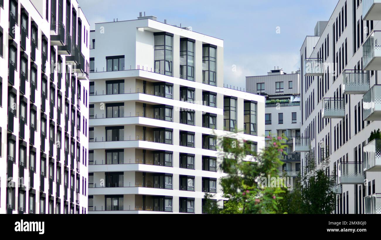 Modern residential building with new apartments in a green residential ... - Modern Green Building Apartment Renovation Case Studies