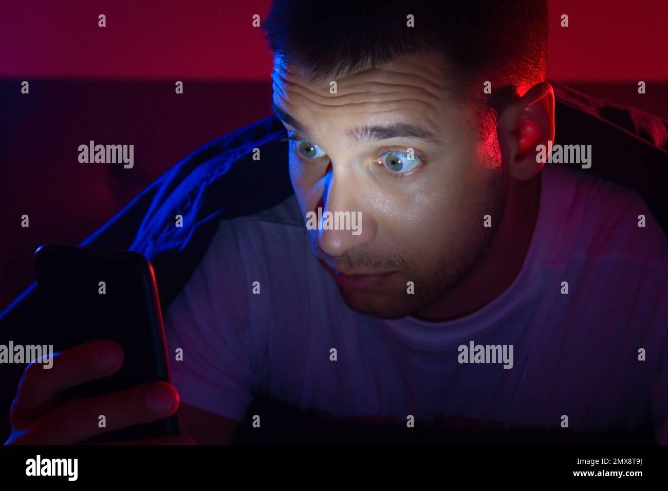 The guy got a security alert on his phone. Alarm button. Danger