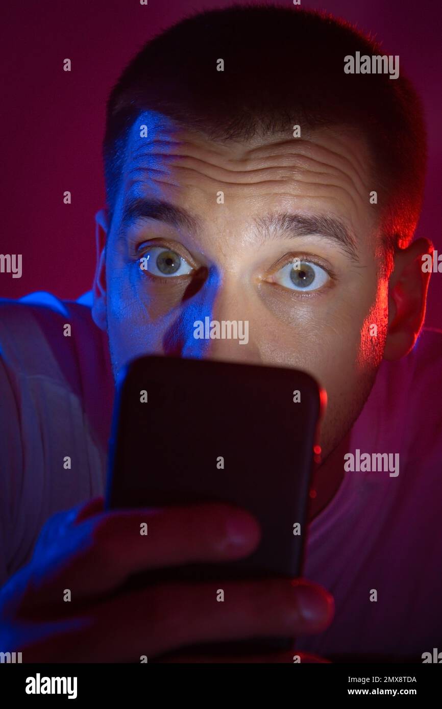 The guy got a security alert on his phone. Alarm button. Danger