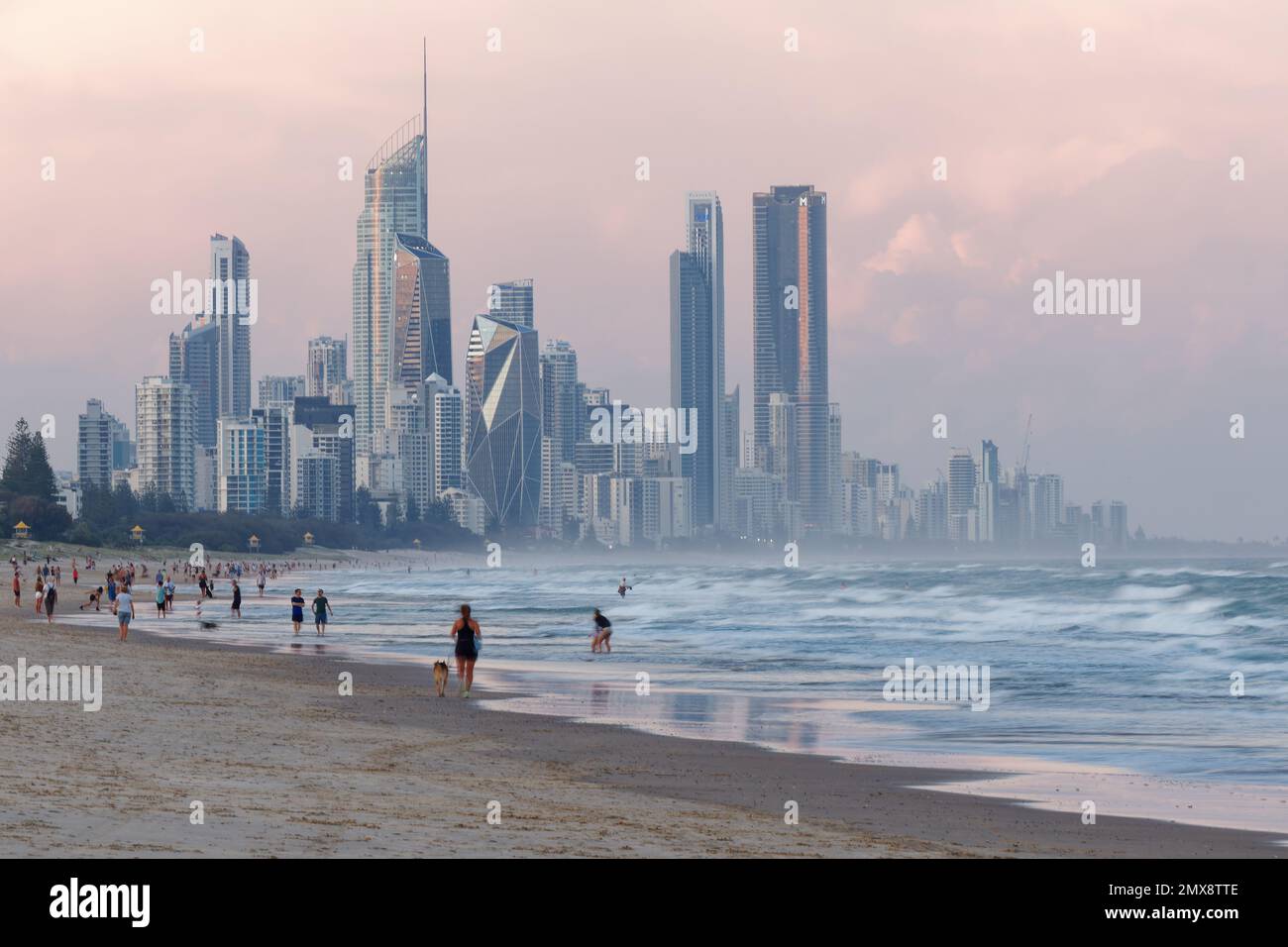 Landscape of Gold Coast, city next to Brisbane in Australia, evening or morning sun on the beach, blue ocean with waves and skyscrapers. Australian ho Stock Photo