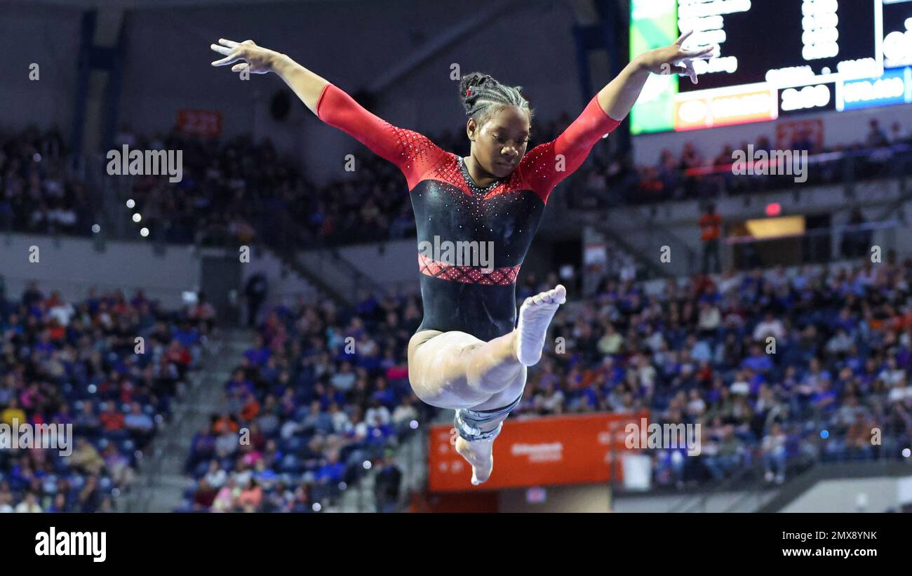 JaFree Scott competes on the beam during an NCAA gymnastics