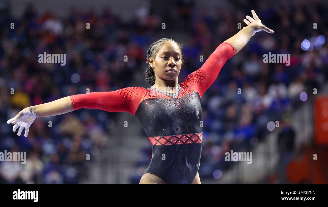 Georgia's JaFree Scott competes on the beam during an NCAA gymnastics ...