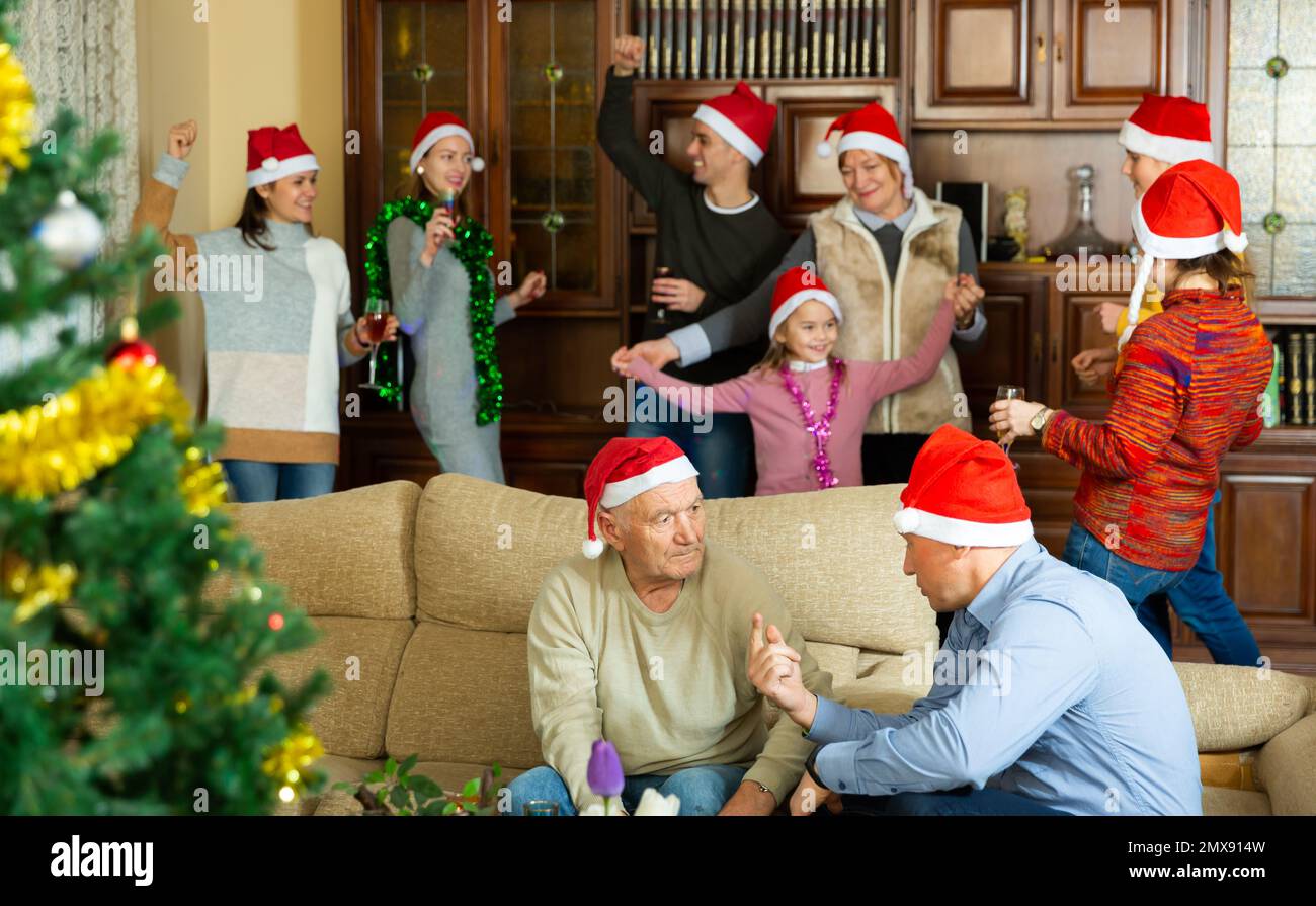 Family spending time together on Christmas night Stock Photo