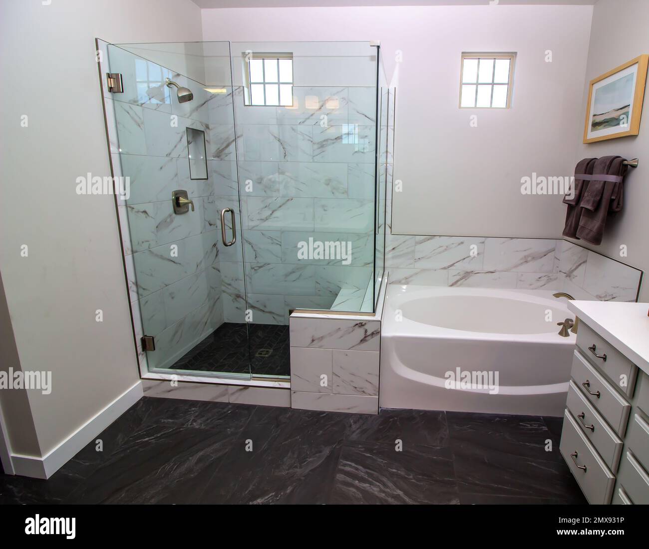 Modern Bathroom With Stall Shower And Bath Tub Stock Photo - Alamy