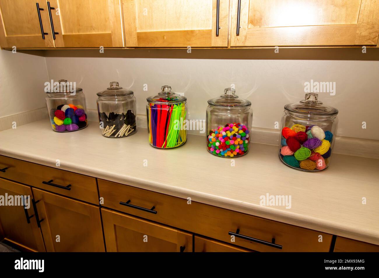 Five Glass Containers On Laundry Room Counter Stock Photo Alamy