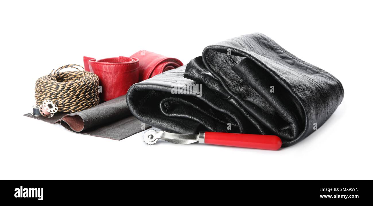 Leather samples and craftsman tools isolated on white Stock Photo