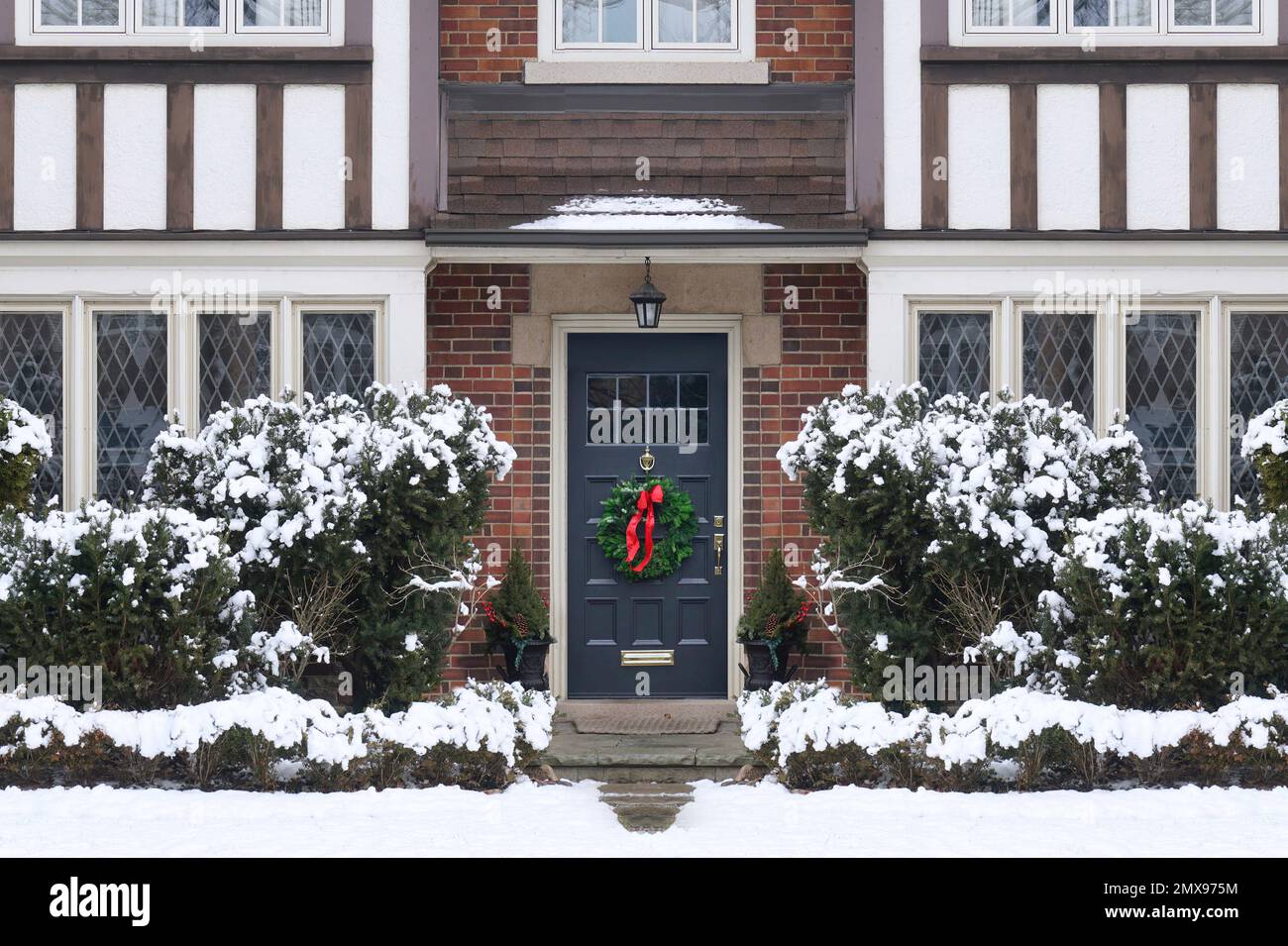 Tudor style house with leaded glass windows in winter Stock Photo