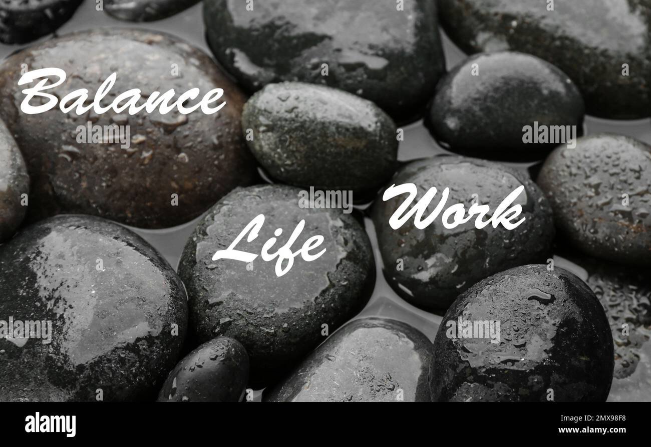 Work-life balance concept. Stones in water, top view Stock Photo - Alamy