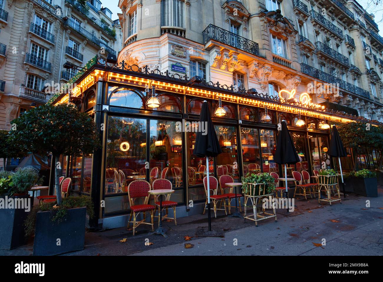 The famous restaurant Le Dome at night. It located on Montparnasse boulevard in Paris. Stock Photo