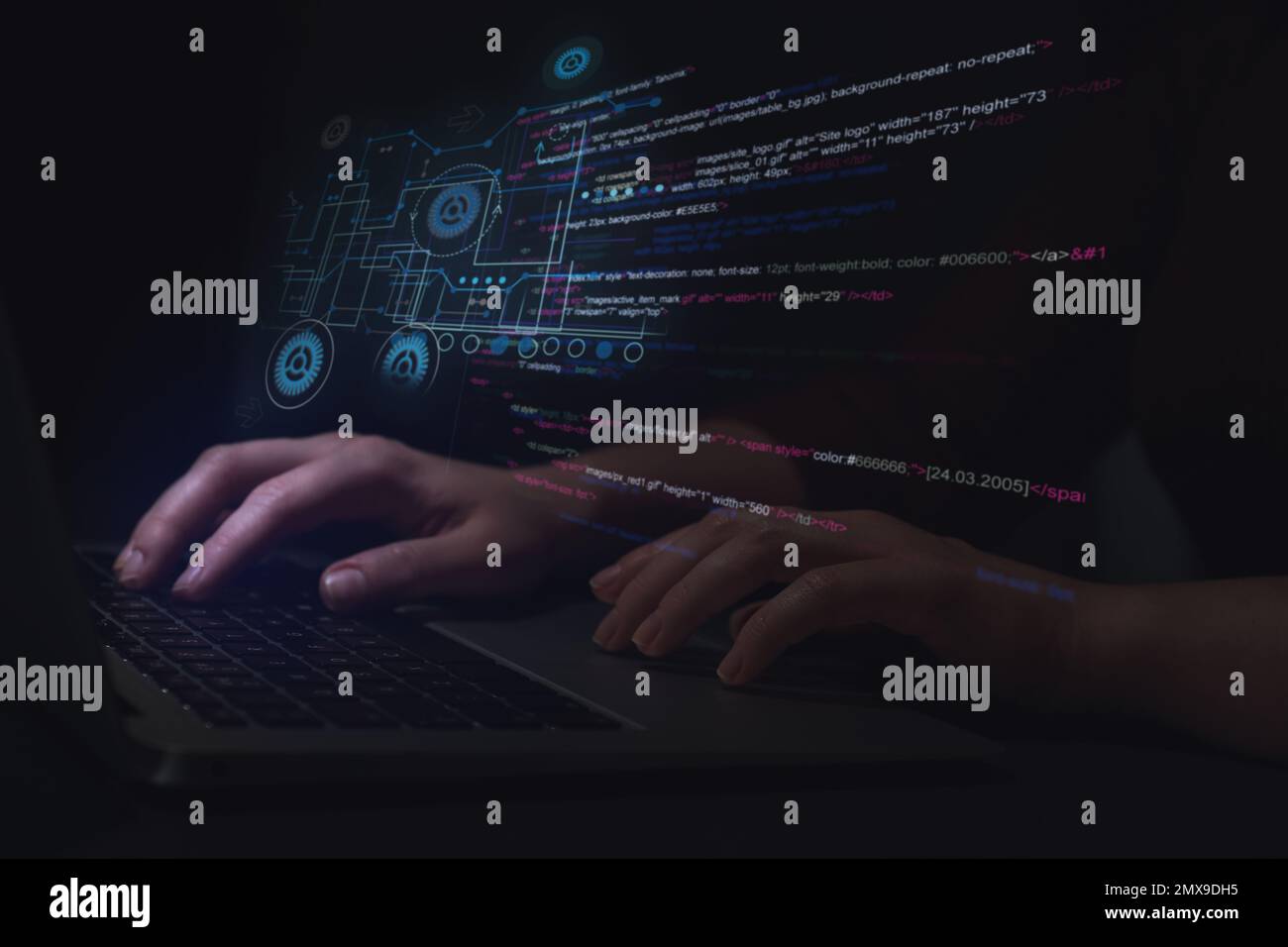 Hacker working with laptop at table, closeup. Cyber attack Stock Photo
