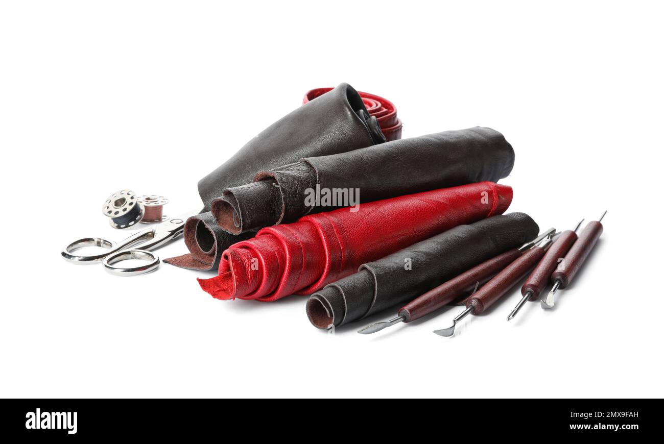 Leather samples and craftsman tools isolated on white Stock Photo