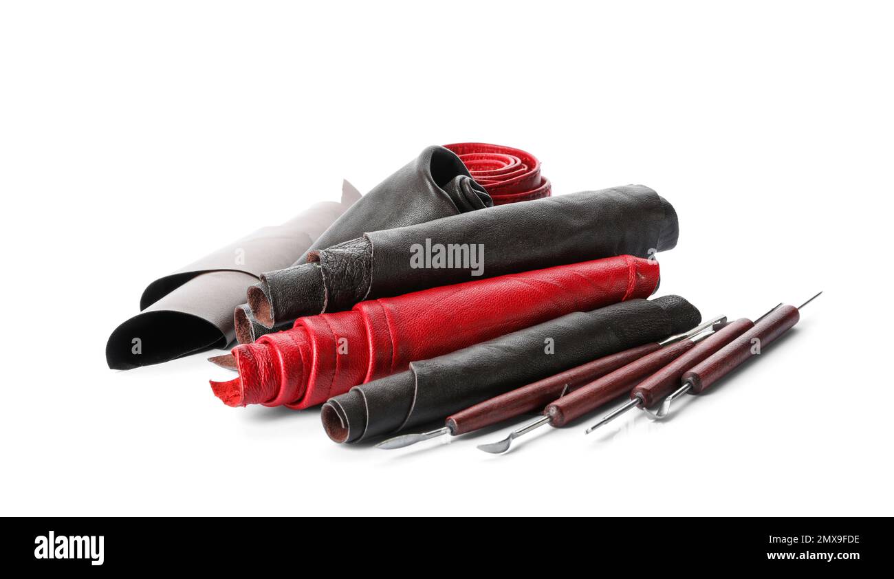Leather samples and craftsman tools isolated on white Stock Photo