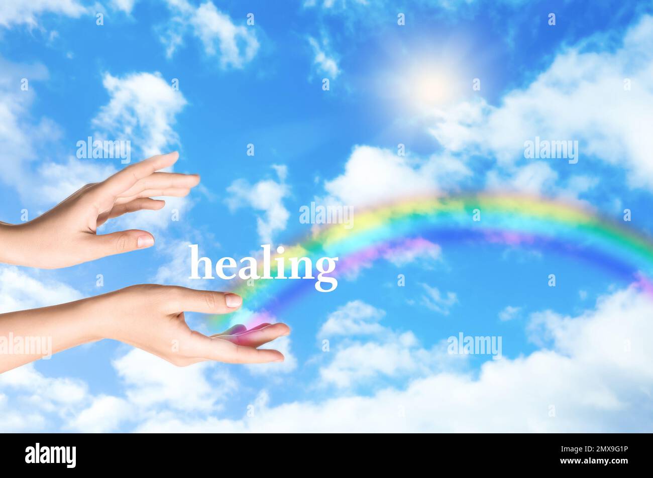 Woman and rainbow as source of healing energy on sunny day, closeup Stock Photo