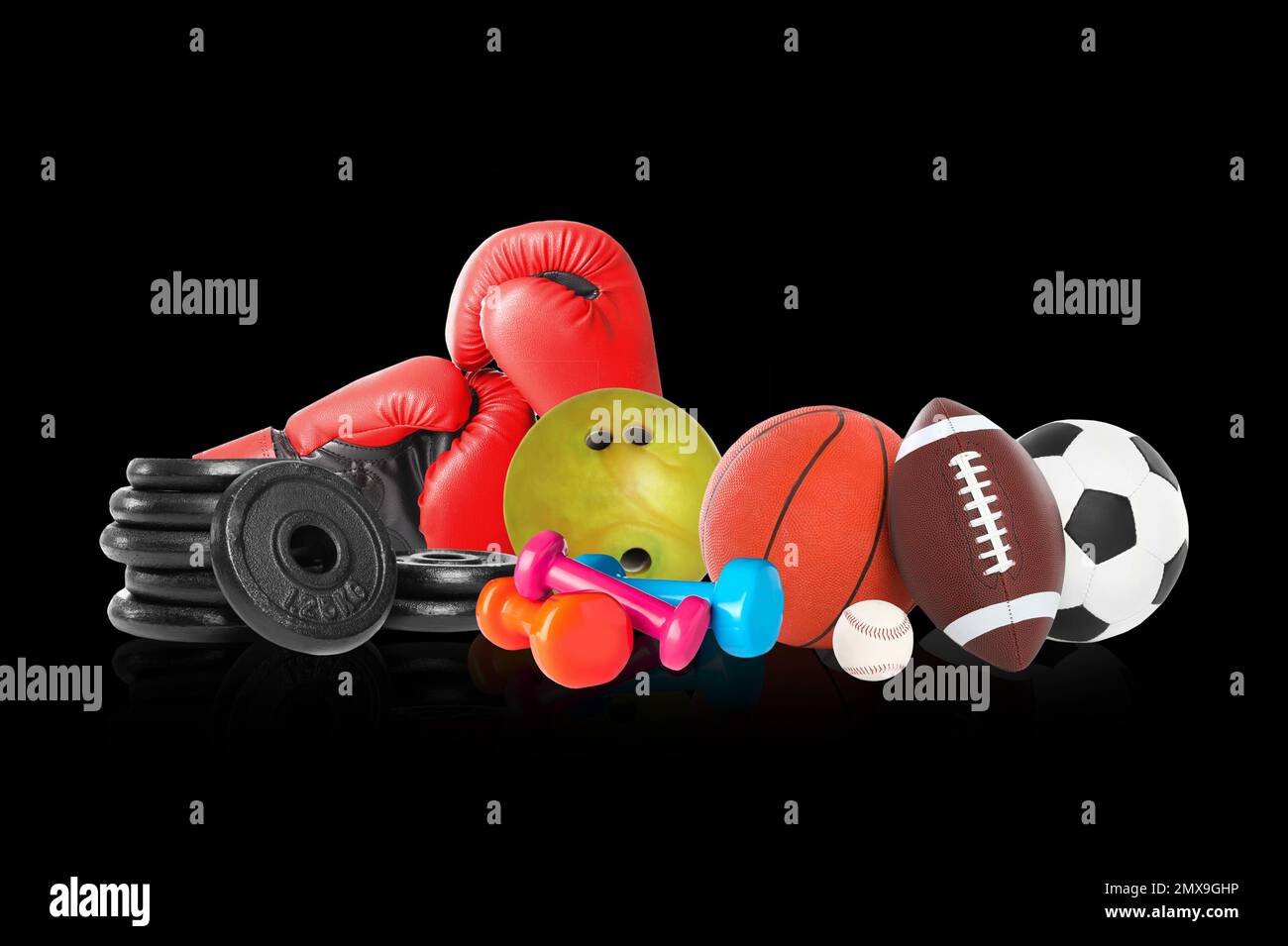 Set of different sport equipment on black background Stock Photo - Alamy