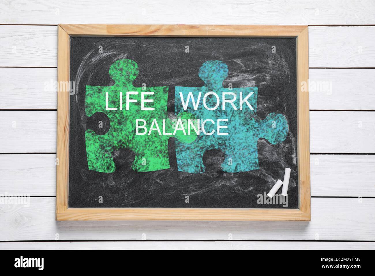 Work-life balance concept. Chalkboard with drawing of connected puzzle ...