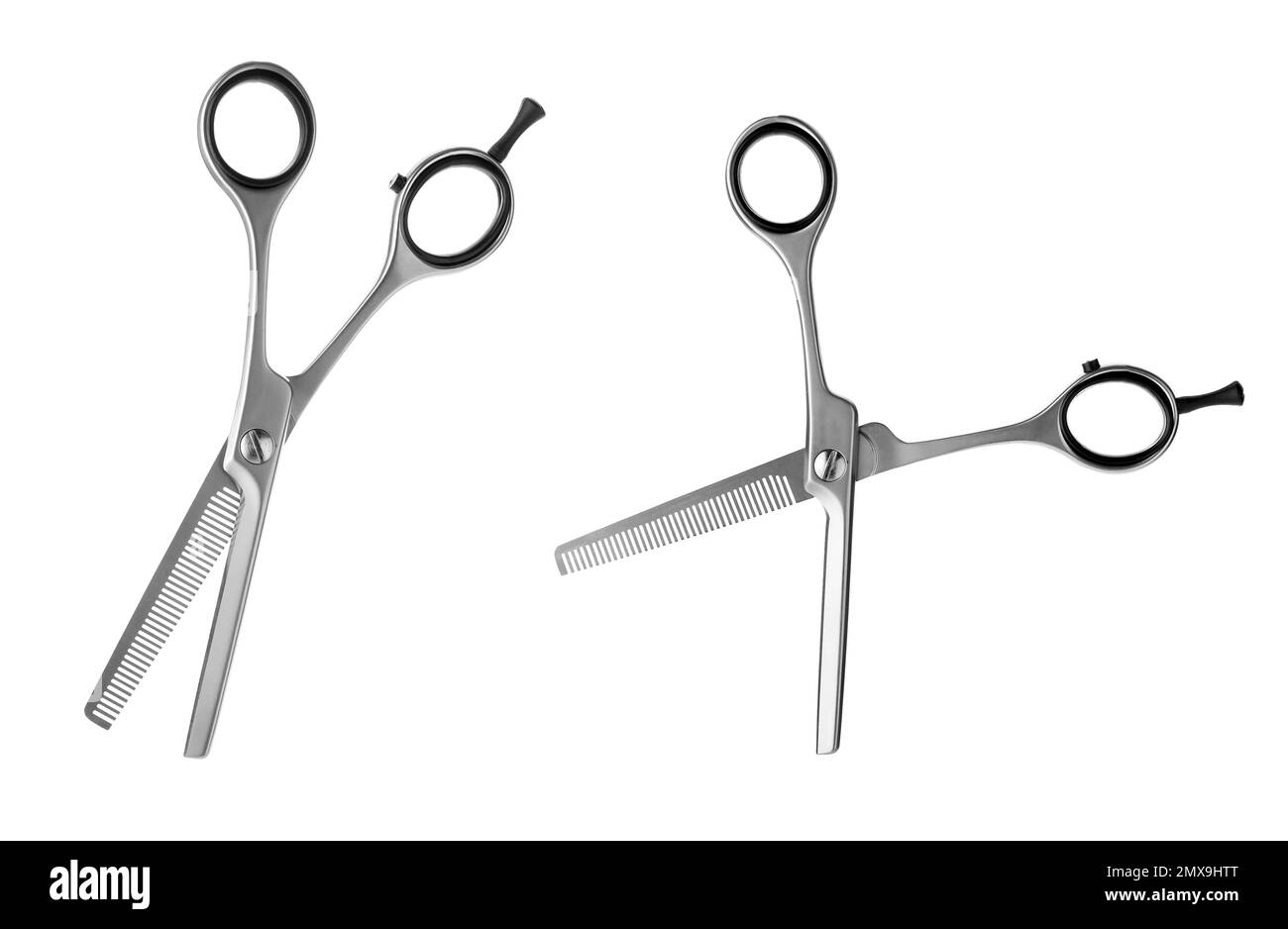 New thinning scissors on white background Stock Photo Alamy