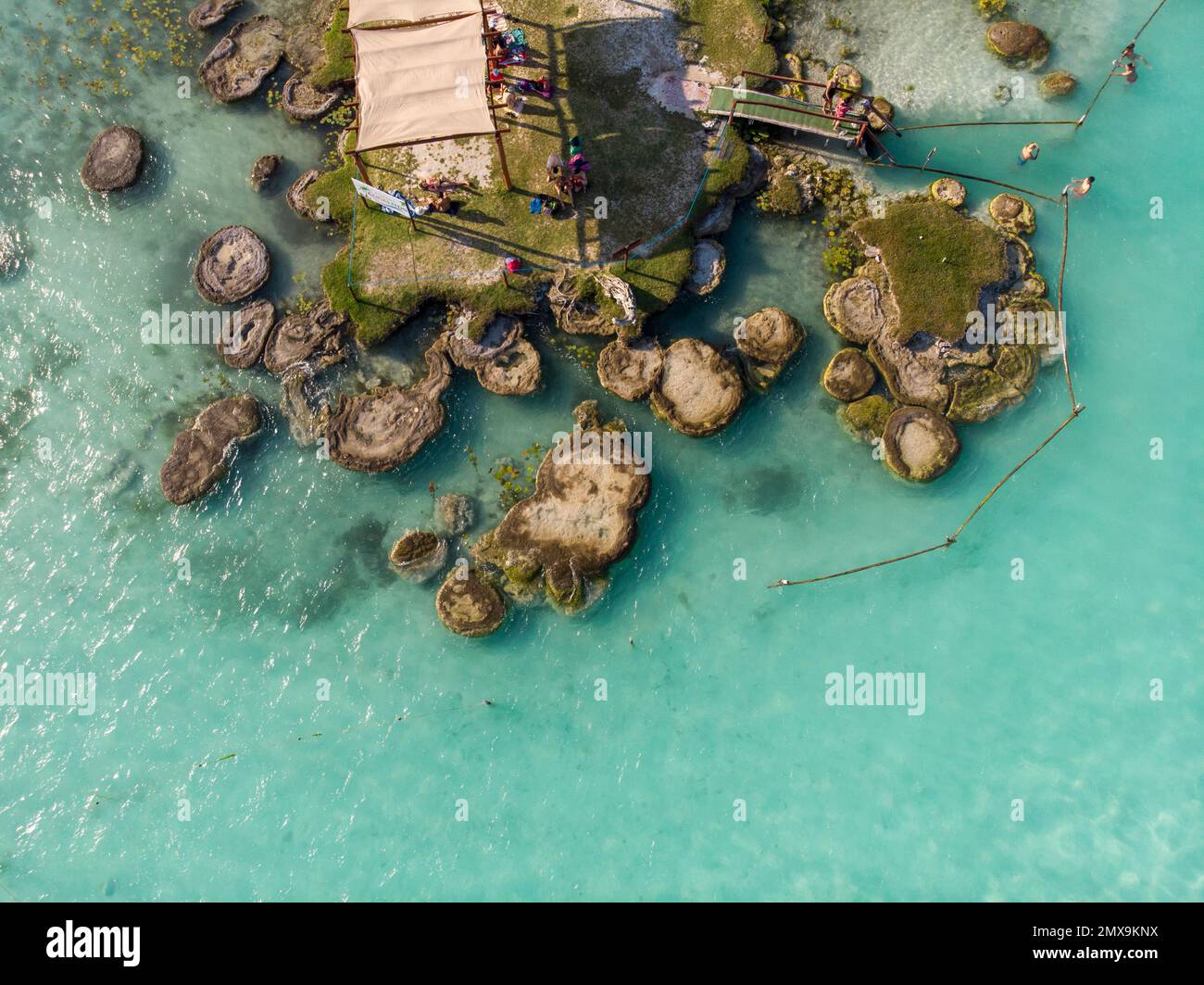 Aerial Drone Shot of Ancient Stromatolites in seven colores lagoon near Bacalar, Quintana Roo, Mexico Stock Photo